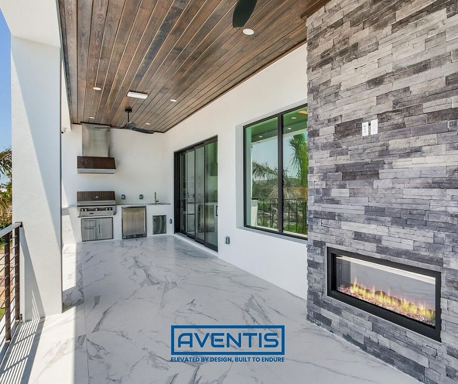 Experience luxury outdoor living with this stunning patio, featuring a modern stone fireplace, sleek built-in grill, and elegant marble flooring—perfect for entertaining or relaxing in style.
.
.
.
#aventishomes #outdoorliving #luxurypatio #moderndesign #outdoorfireplace #patiogoals #backyardoasis #homeinspiration #outdoorkitchen #entertaininstyle #dreamhome #patiodecor #luxuryhomes #homedesign #modernhome #outdoorspace #constructioncompany #customhomes #buildwithus #qualityconstruction