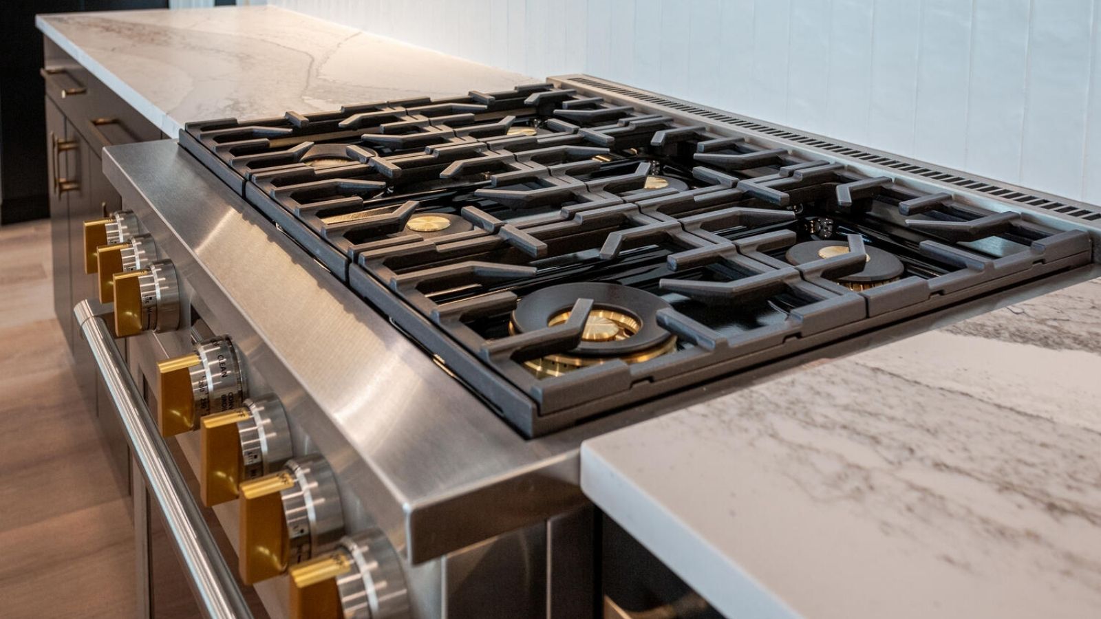 a gas stove top in a modern kitchen